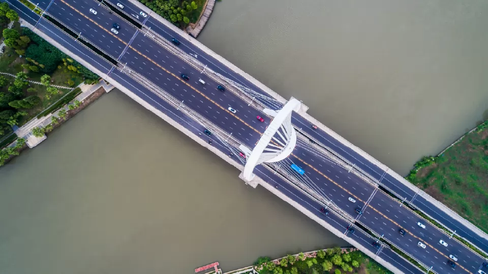 Sensors and data acquisition units work together in a bridge monitoring system for comprehensive analysis.